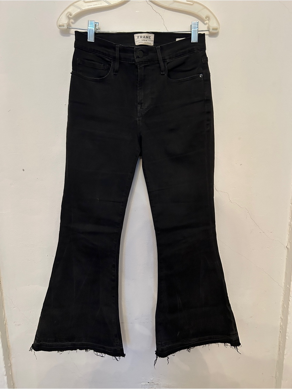 Frame Denim Black “Le Crop Bell” Jeans with Raw Hem